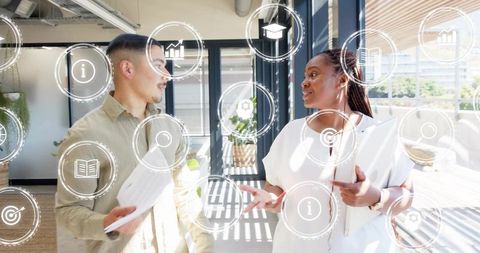 Colleagues Collaborating in Sunlit Open Office with Digital HUD Overlay