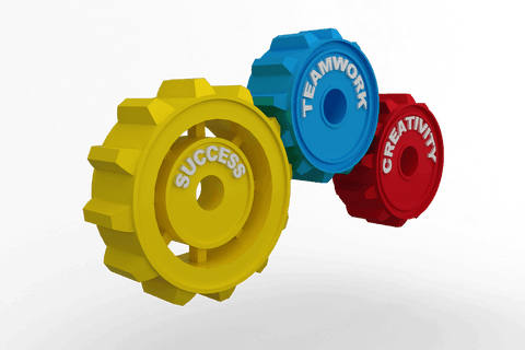 Colorful cogs highlighting success, teamwork, creativity