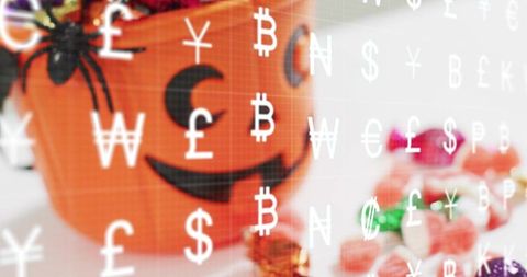 Halloween pumpkin sitting with candy and floating currency symbols for fintech concept