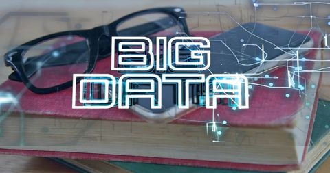 Big data concept showing books, glasses and smartphone with glowing data overlay