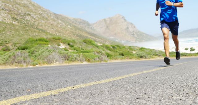 Runner Training on Open Road by Mountain Landscape - Download Free Stock Images Pikwizard.com