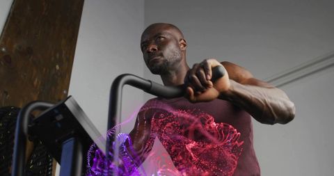 Athlete Training on Elliptical with Digital Data Overlays