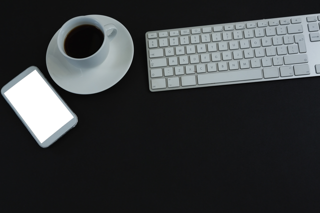 Transparent Flat Lay of Keyboard, Mobile Phone and Coffee on Black Office None - Download Free Stock Videos Pikwizard.com