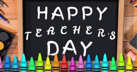 Chalkboard with Happy Teacher's Day and Colorful Crayons