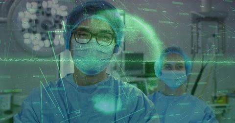 Surgeons Analyzing Digital Patient Data in Operating Room