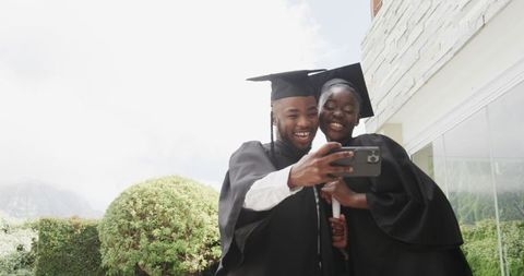 Graduates Celebrate Success with Joyful Selfie