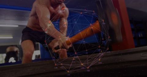 Sledgehammer tire slams performing explosive strength training with data network overlay