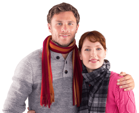 Couple wearing cozy winter clothing and scarves, with man having arm around woman, sharing warm smile. Use for themes like winter fashion, couple relationships, or seasonal greetings.