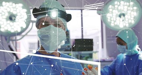 Lead surgeon guiding surgical team with headlamp and augmented reality overlay