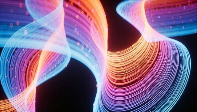 Flowing multicolored neon light ribbons creating vibrant loops and glowing particle trails