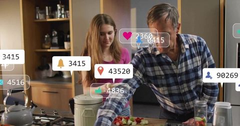 Multigenerational family cooking together in modern kitchen with social ar overlays smiling