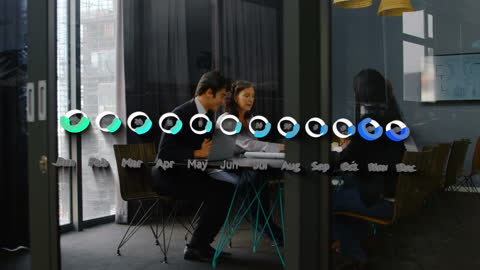 Diverse Team Analyzing Digital Graph in Modern Office