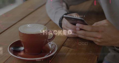 Cybersecurity Alert: Coffee and Smartphone Hacking Concept