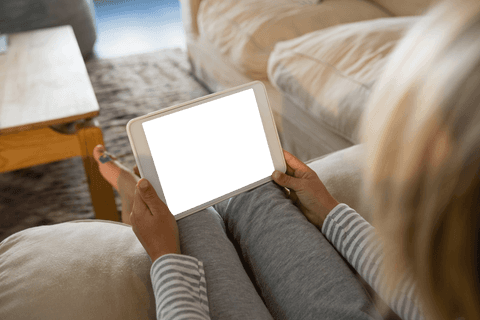 Boy Holding Transparent Tablet in Cozy Living Room - Download Free Stock Videos Pikwizard.com