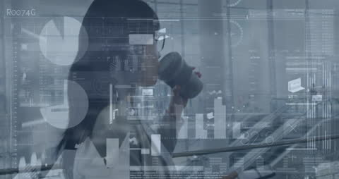 Businesswoman Analyzing Digital Data Overlay in Modern Office