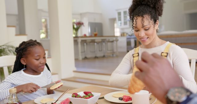 Happy Family Having Breakfast in Sunny Kitchen - Download Free Stock Images Pikwizard.com