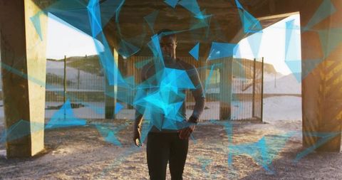 Athlete training with augmented reality overlays under pier at sunrise wearing smartwatch