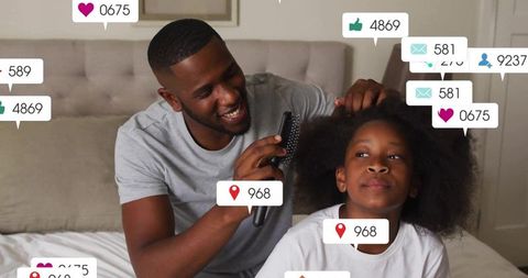 Father brushing daughter's hair surrounded by social media notifications