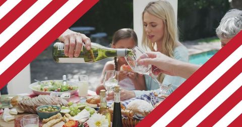 Family Gathering with Wine around Patriotic Table Setting