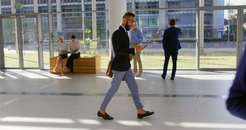 Young Professionals in Bright Modern Office - Download Free Stock Images Pikwizard.com