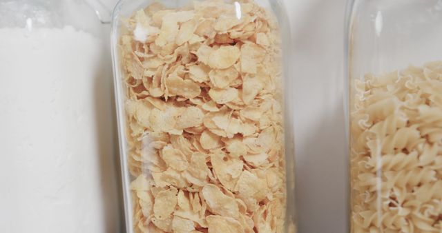 Close-up of Cornflakes in Glass Container for Storage - Download Free Stock Images Pikwizard.com