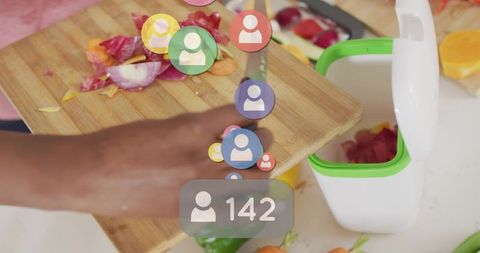 Tipping vegetable scraps into countertop compost bin with floating social follower icons