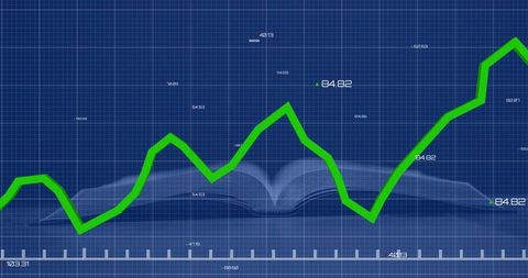 Blueprint Analysis with Green Line Graph on Open Book