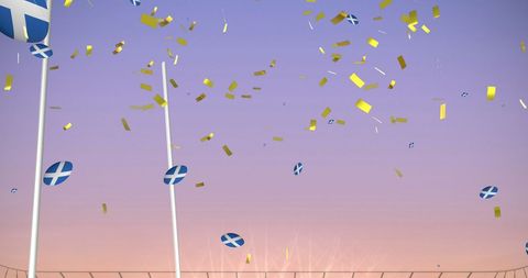 Celebratory Confetti and Scottish Rugby Balls Falling in Stadium