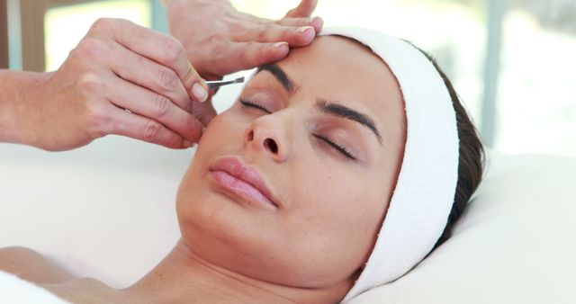 Woman Receiving Professional Facial Treatment at Spa - Download Free Stock Images Pikwizard.com