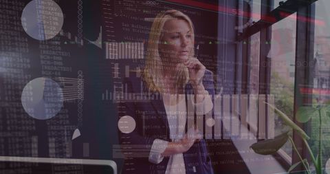 Innovative Businesswoman Analyzing Data with Digital Interface