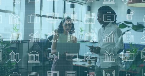 Diverse Coworkers Analyzing Reports with Overlay Icons