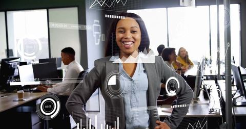 Confident Businesswoman Presenting Holographic Analytics in Modern Office