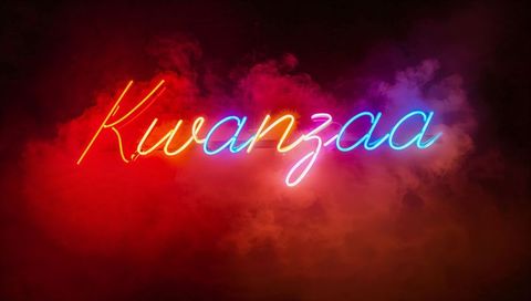 Glowing neon kwanzaa script sign casting colorful smoke halo for festive celebration glow