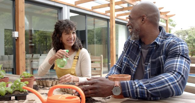 Diverse Couple Enjoying Gardening Together Outdoors - Download Free Stock Images Pikwizard.com