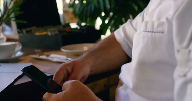 Person Texting on Smartphone at Cafe Table - Download Free Stock Images Pikwizard.com