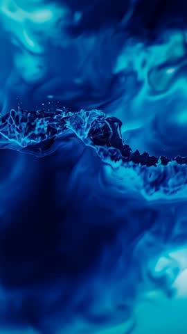 Pulsing Blue Fluid Ridge Moving in Macro Vertical Video Showing Abstract Liquid Motion
