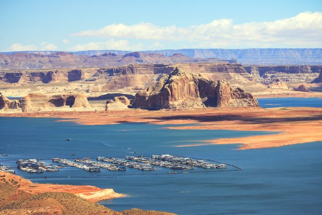 Beautiful Lake Powell with Boat Docks and Rock Formations - Download Free Stock Photos Pikwizard.com