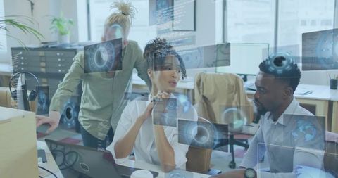 Collaborating team using futuristic hud dashboards and data visualization in modern startup office