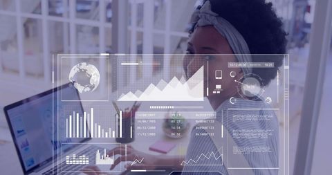 African american businesswoman analyzing data with laptop