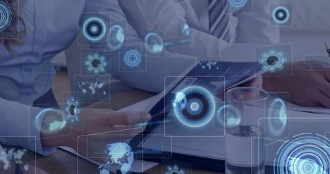 Teamworking in Futuristic Office with Digital Interface Overlay