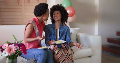 Joyful Birthday Celebration with Loving Feeding Gesture