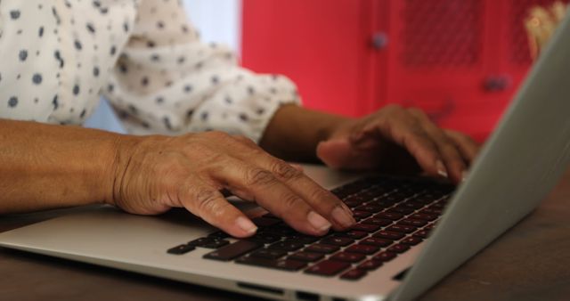 Senior Woman Typing on Laptop Keyboard at Home Office - Download Free Stock Images Pikwizard.com