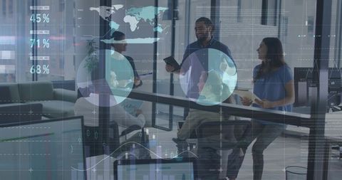 Business team collaborating around presenter holding tablet with data analytics overlays