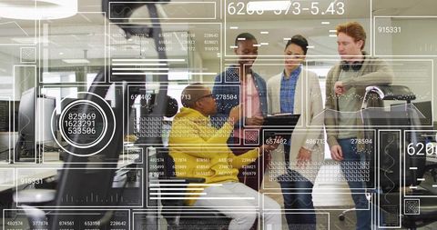 Diverse team collaborating over AR dashboards and data visualization in open office