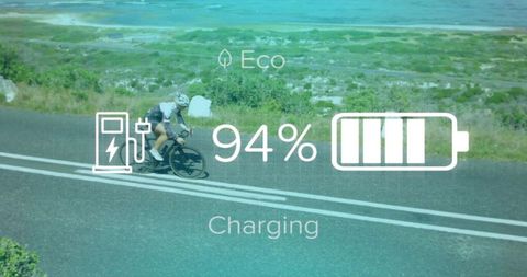 Woman on E-Bike with Eco Overlay and Charging Indicator on Scenic Road