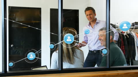 Diverse Business Team Discussing Digital Networking Solutions