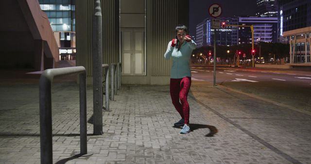 Young Woman Boxing on Urban Night street - Download Free Stock Images Pikwizard.com