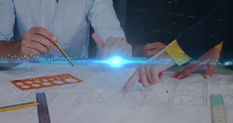 Architects Collaborating Over Building Plans and Blueprints