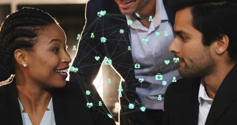 Colleagues Discussing Tech Solutions with Digital Interface Overlay