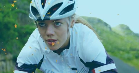 Determined cyclist pedals through mountain adventure